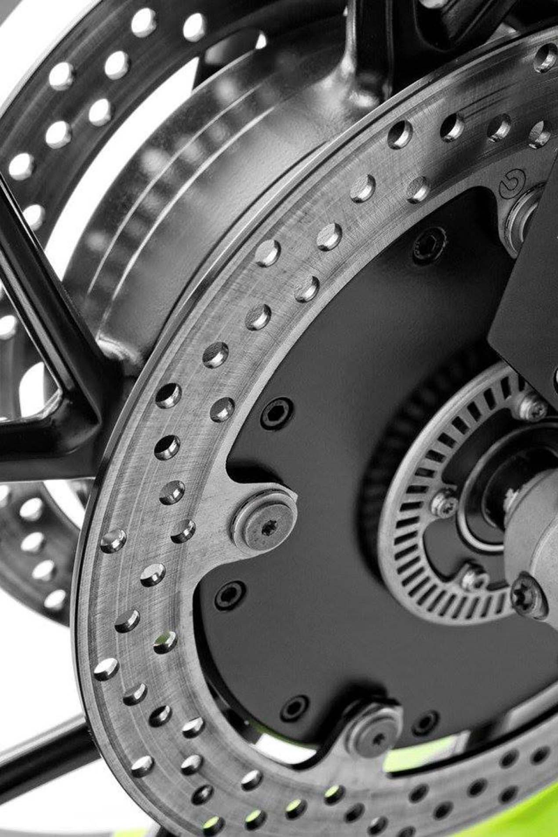 Illustration for article titled This Company Will Build You A Kickass Hybrid Two-Wheel Drive BMW Adventure Bike